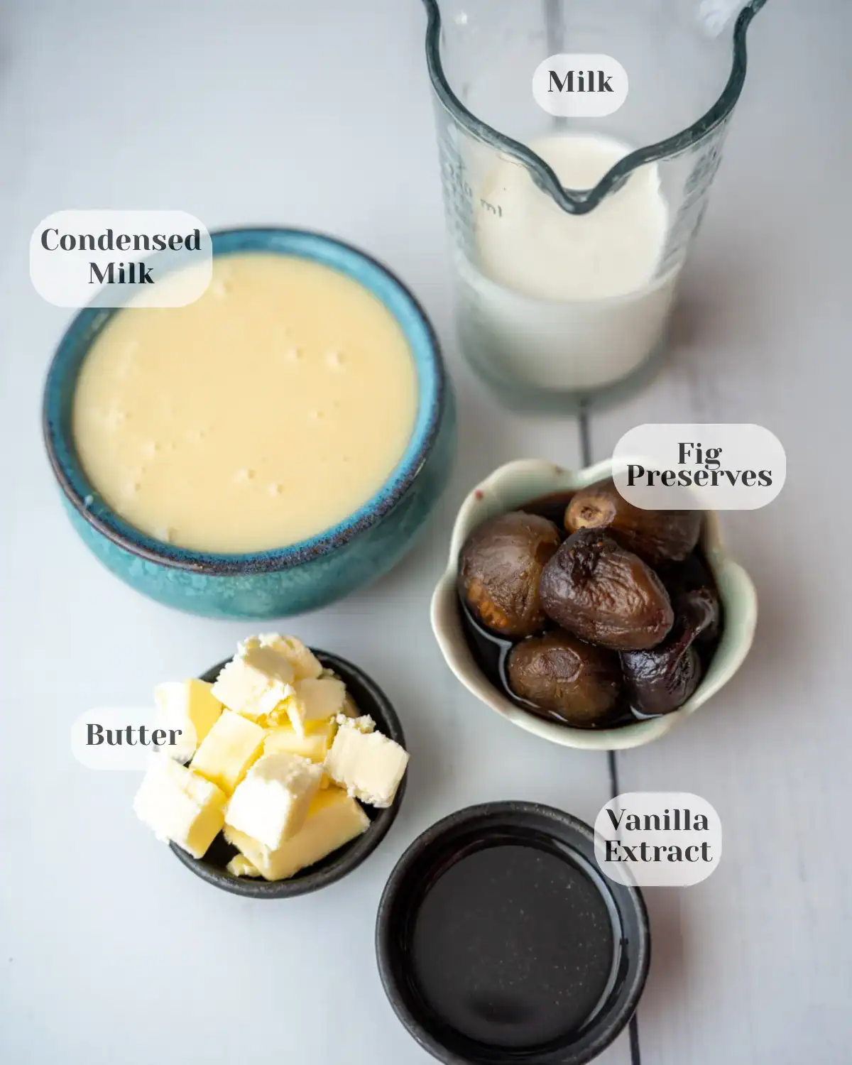 Overhead photo of the ingredients for the condensed milk glaze, with each ingredient labeled by name